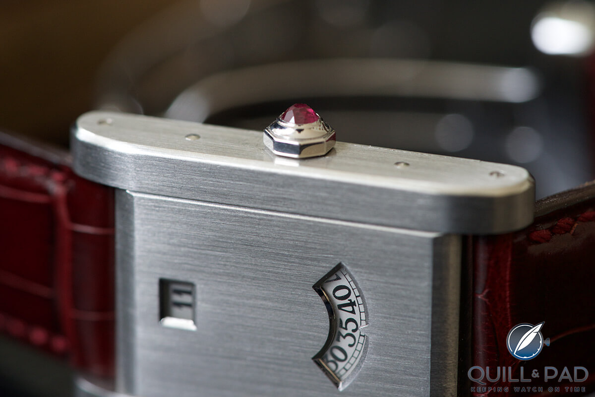 Ruby cabochon in the crown of the Tank à Guichets in platinum