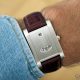 Cartier Tank à Guichets in platinum on the wrist