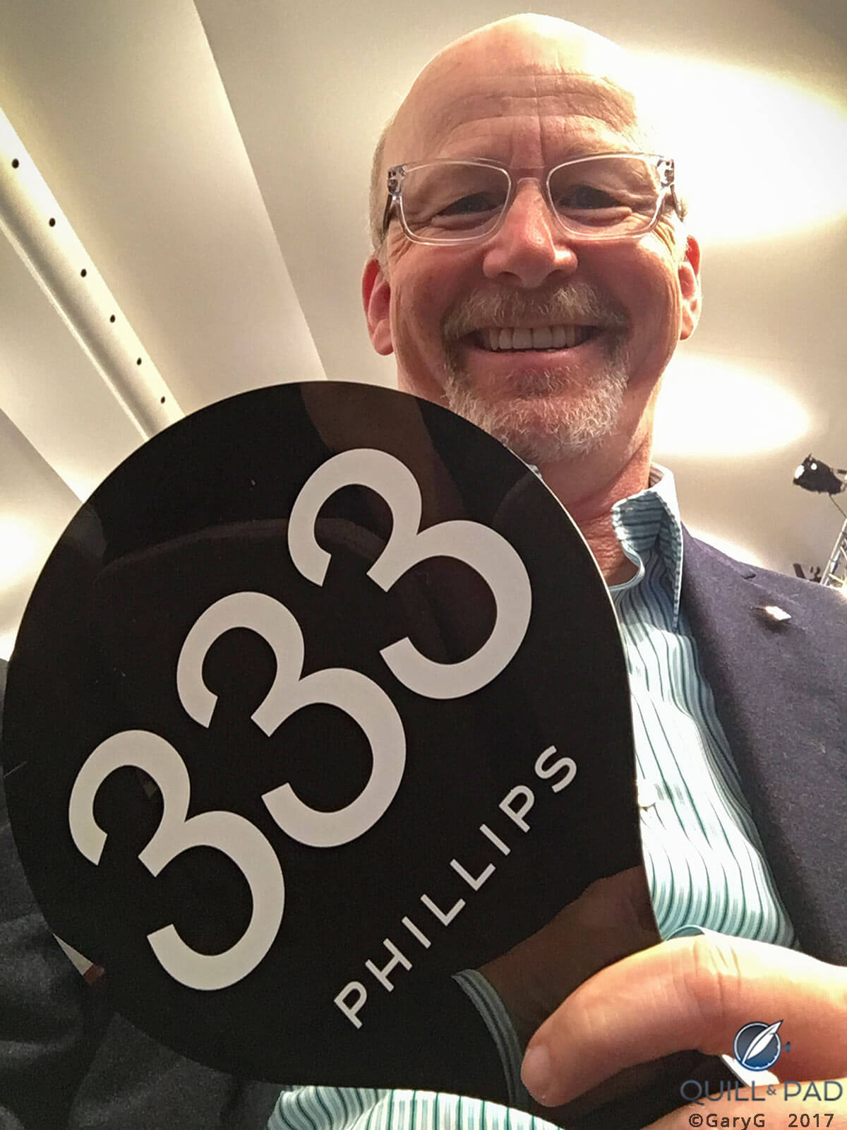 I’m not superstitious (touch wood): the author and lucky number paddle, Phillips auction