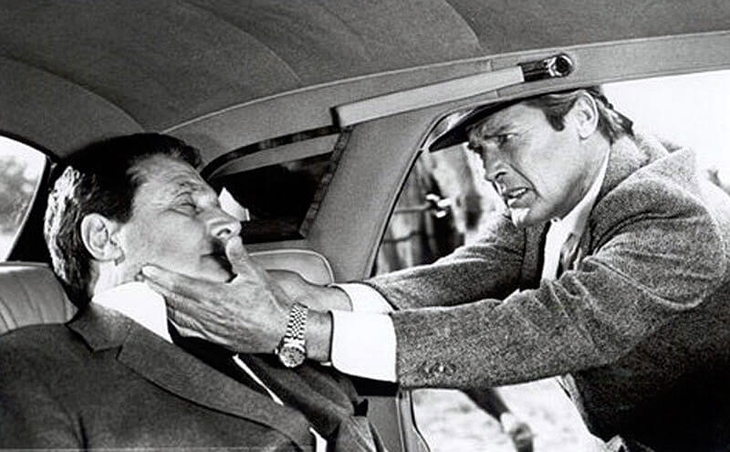 Roger Moore wearing a Rolex Datejust in 'A View To A Kill'