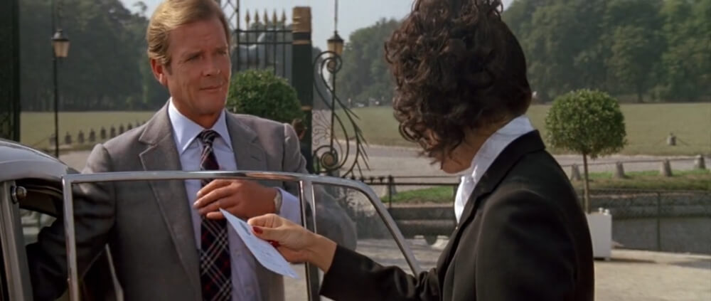 Roger Moore wearing a barely visible two-tone Seiko in A View To A Kill