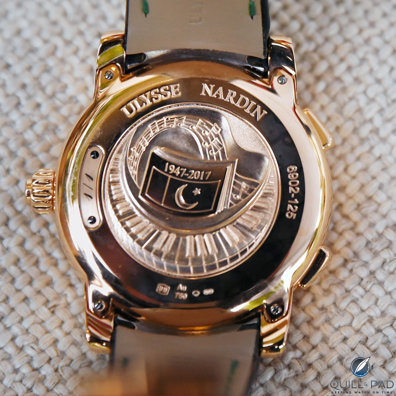 Engraved back of the Ulysse Nardin Stranger Anthem, which plays the 'Quaumi Tarana'