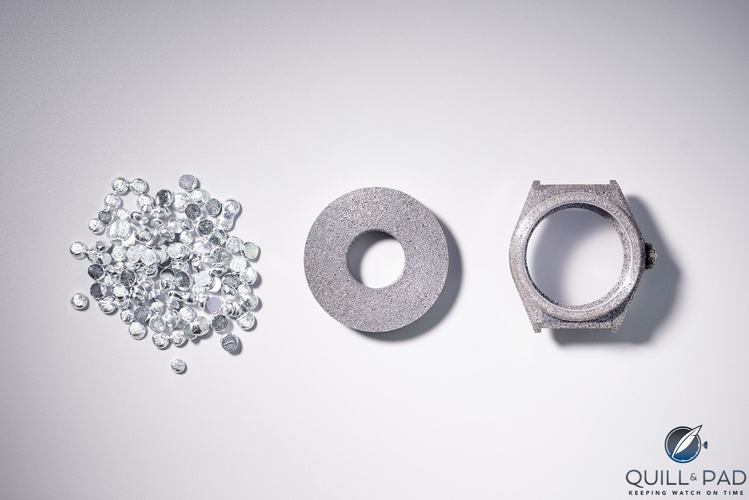 Zenith Defy Lab's case (far right) and the aluminum and polymer ingredients that go into it