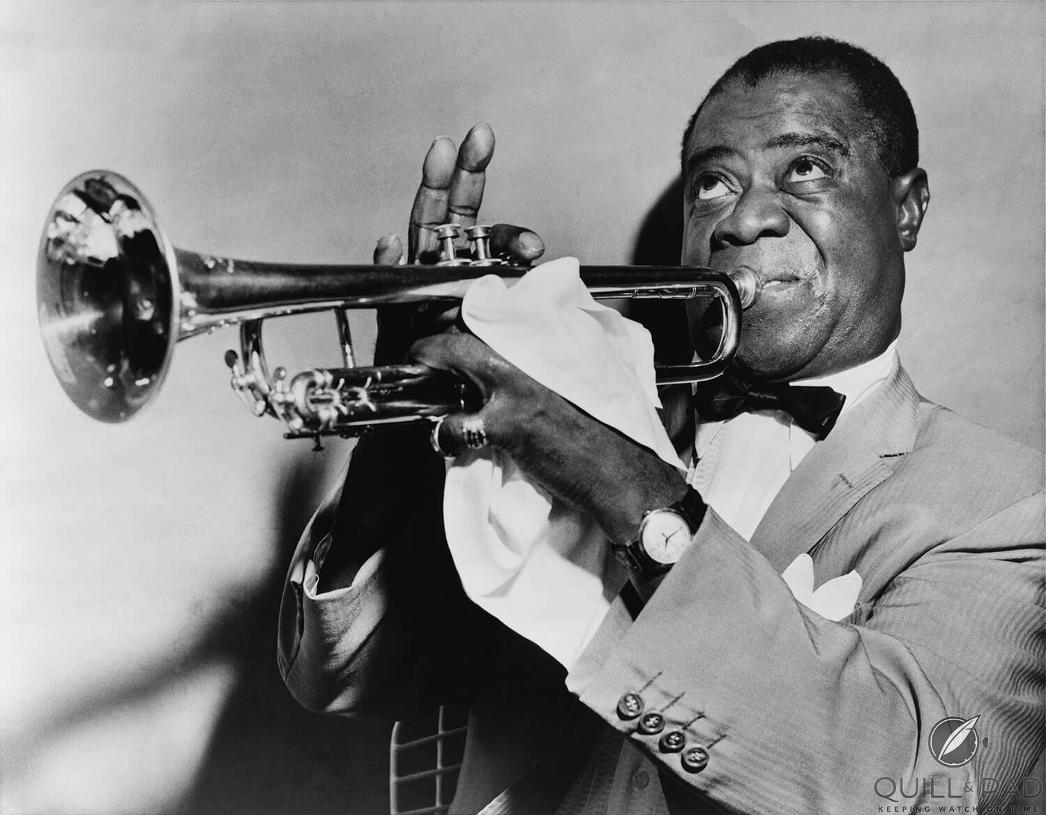 Louis Armstrong playing trumpet in 1953, wearing his prized gold wristwatch