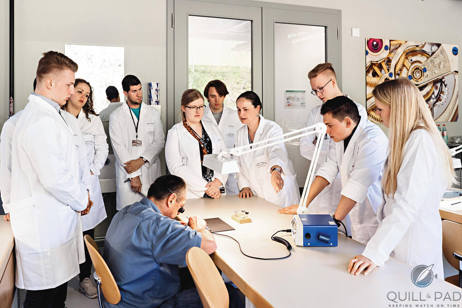 The eight student competitors plus the author (center) watching a demonstration at the A. Lange & Söhne factory (photo courtesy E. Gross/A. Lange & Söhne)