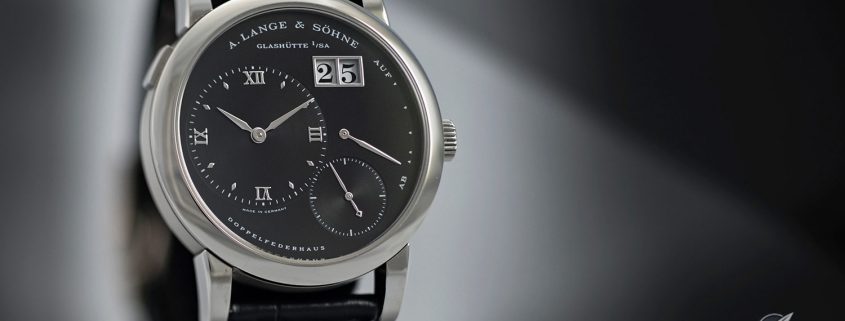 Lange 1 in stainless steel with black face