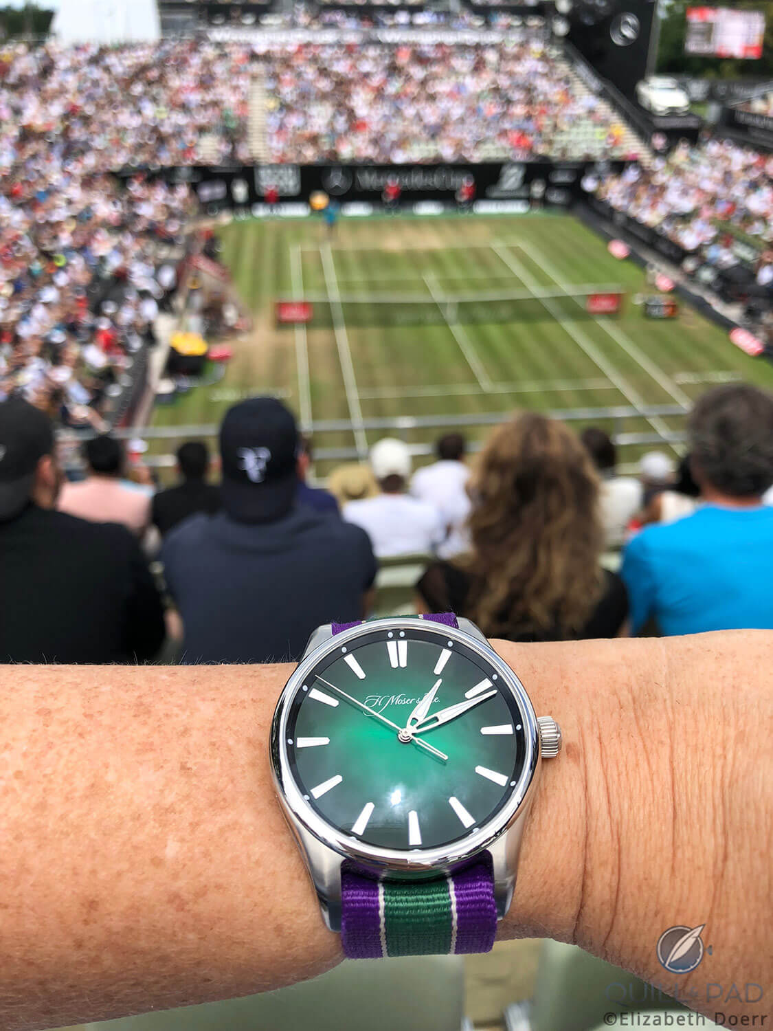 The H. Moser Cie Pioneer Center Seconds Cosmic Green on a Wimbledon-inspired NATO strap by Maurice de Mauriac designed by Miguel Seabra at the Mercedes Open 2018