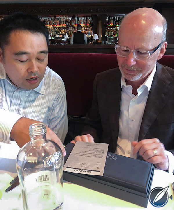 Noritake Sakurai reviews the Tsunami’s warranty with GaryG (photo courtesy AllenS)