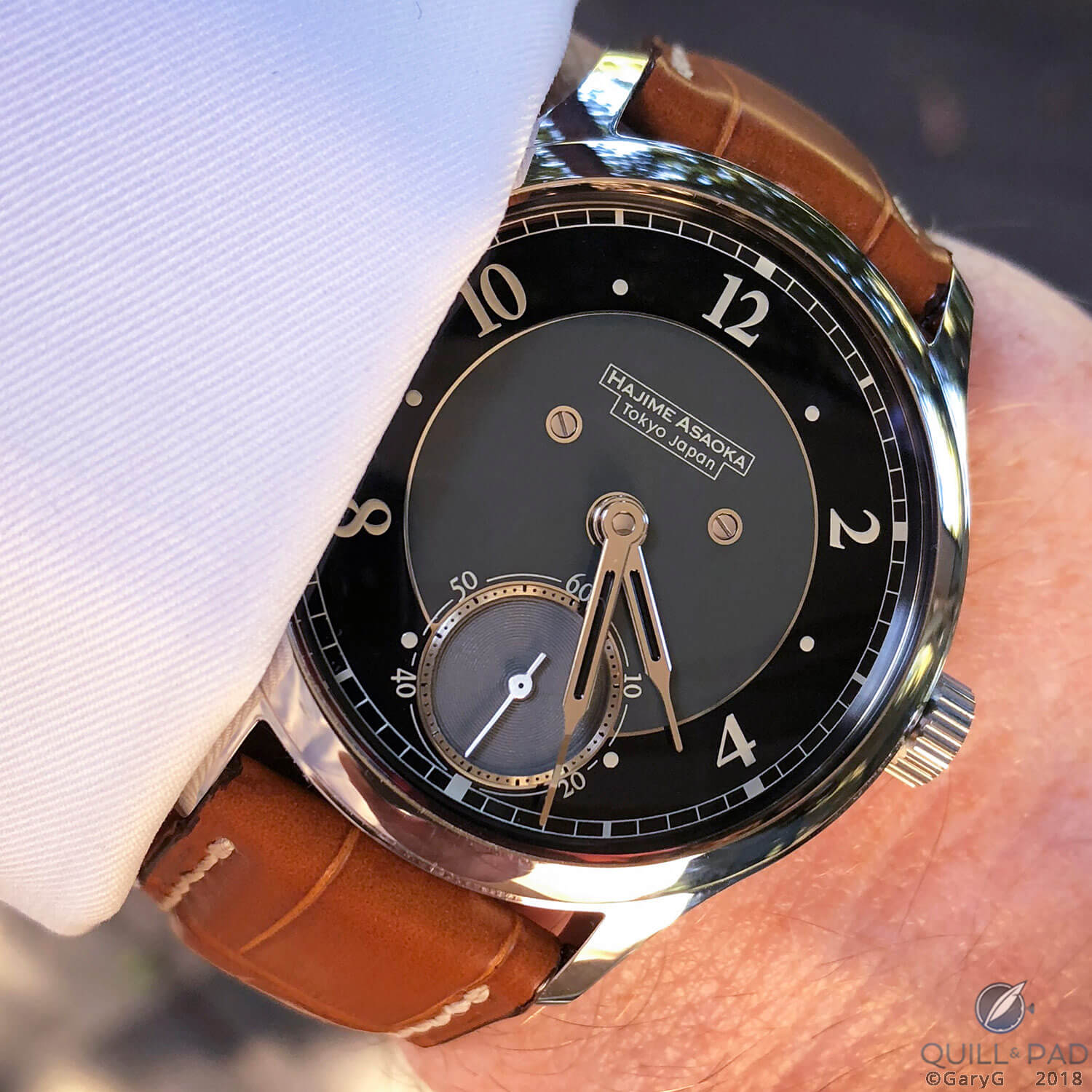 On the wrist: Hajime Asaoka Tsunami