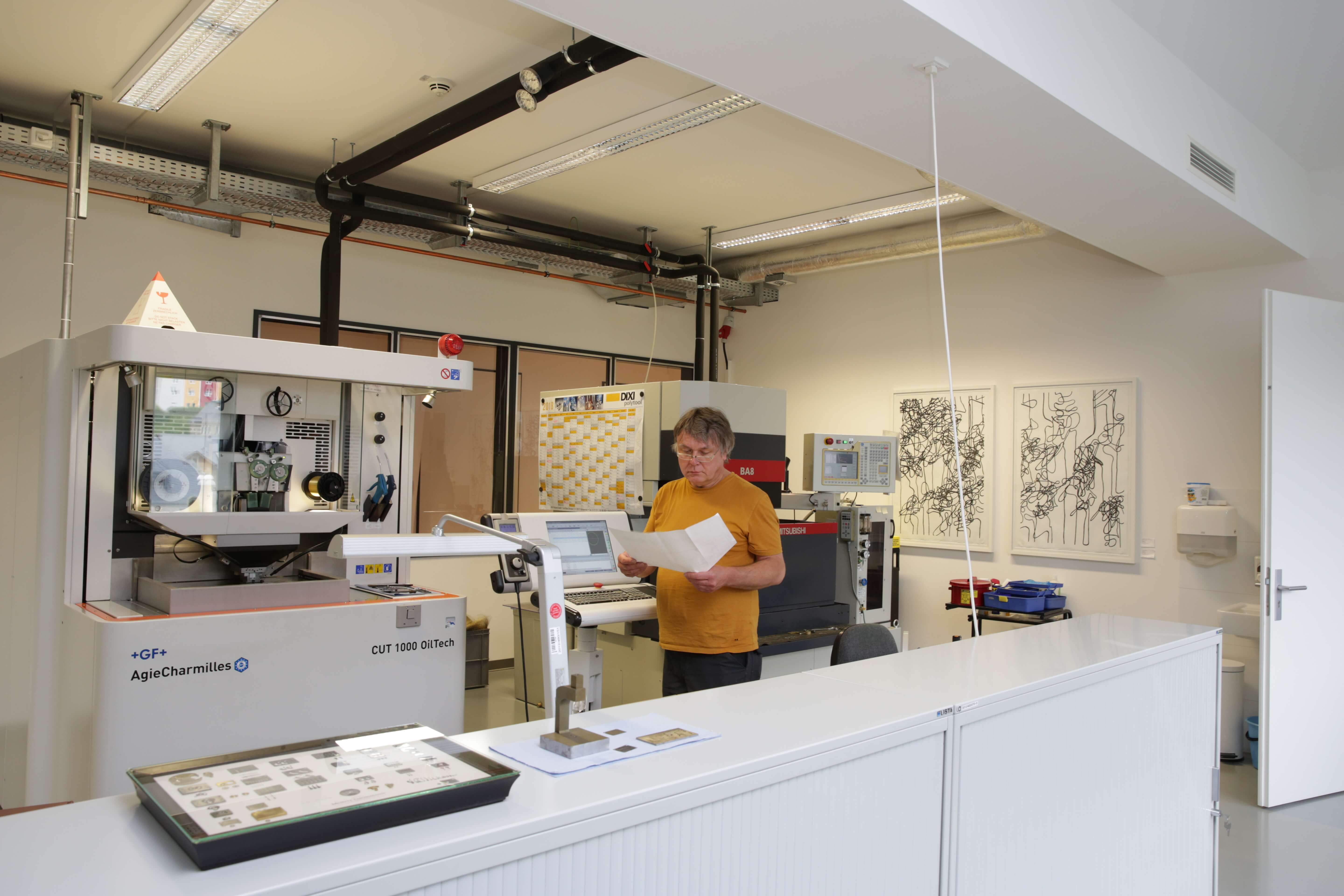 Moritz Grossman: how many wire erosion workshops feature artwork on the walls?