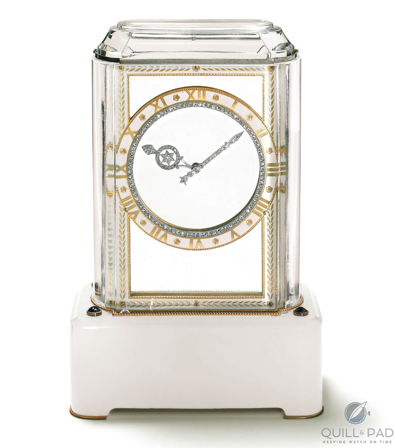 Model A Cartier Mystery Clock from 1912 featuring platinum, gold, white agate, rock crystal, sapphires, rose-cut diamonds, enamel