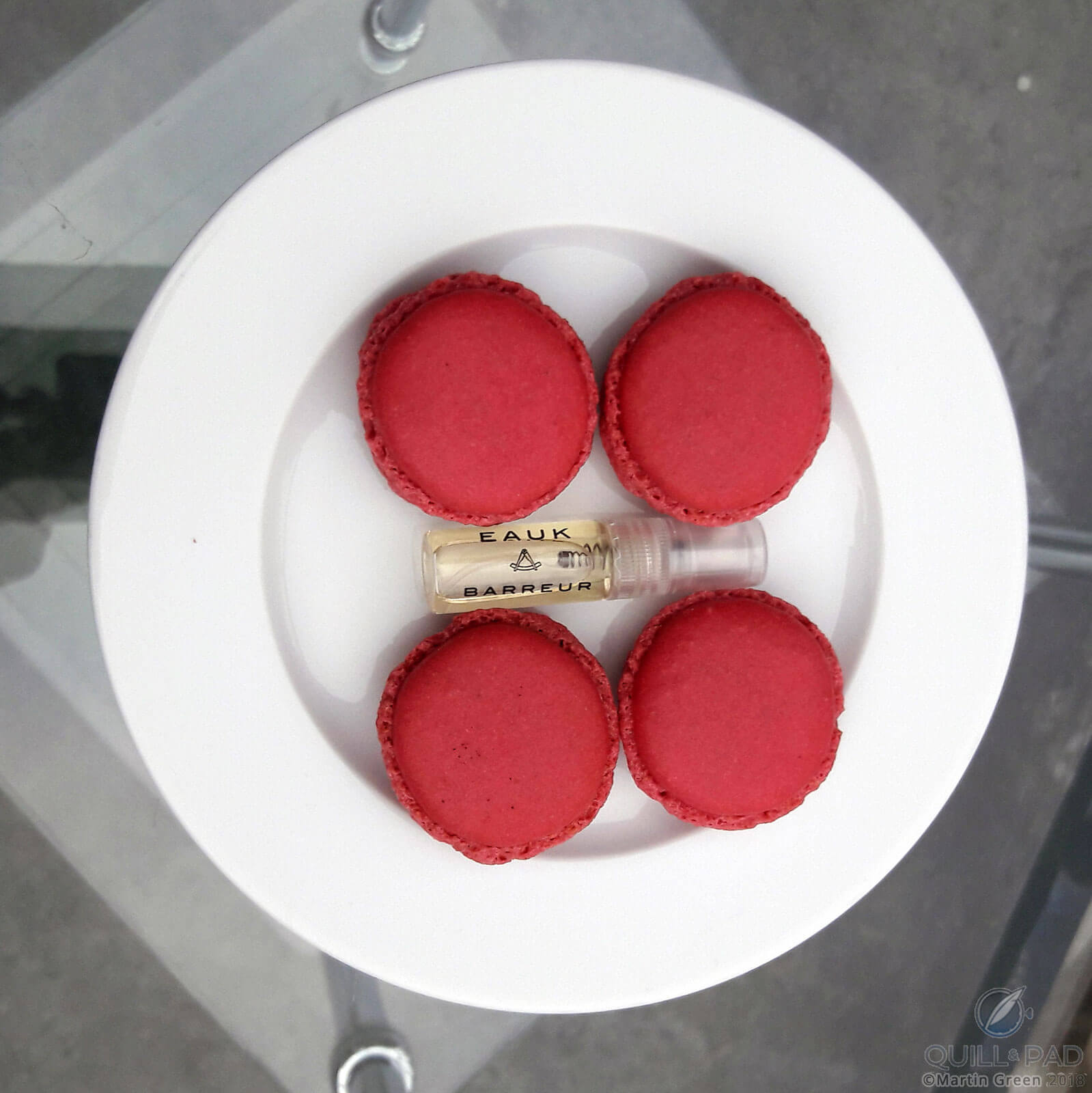 Eauk Barreur sample between colorful macarons in Paris
