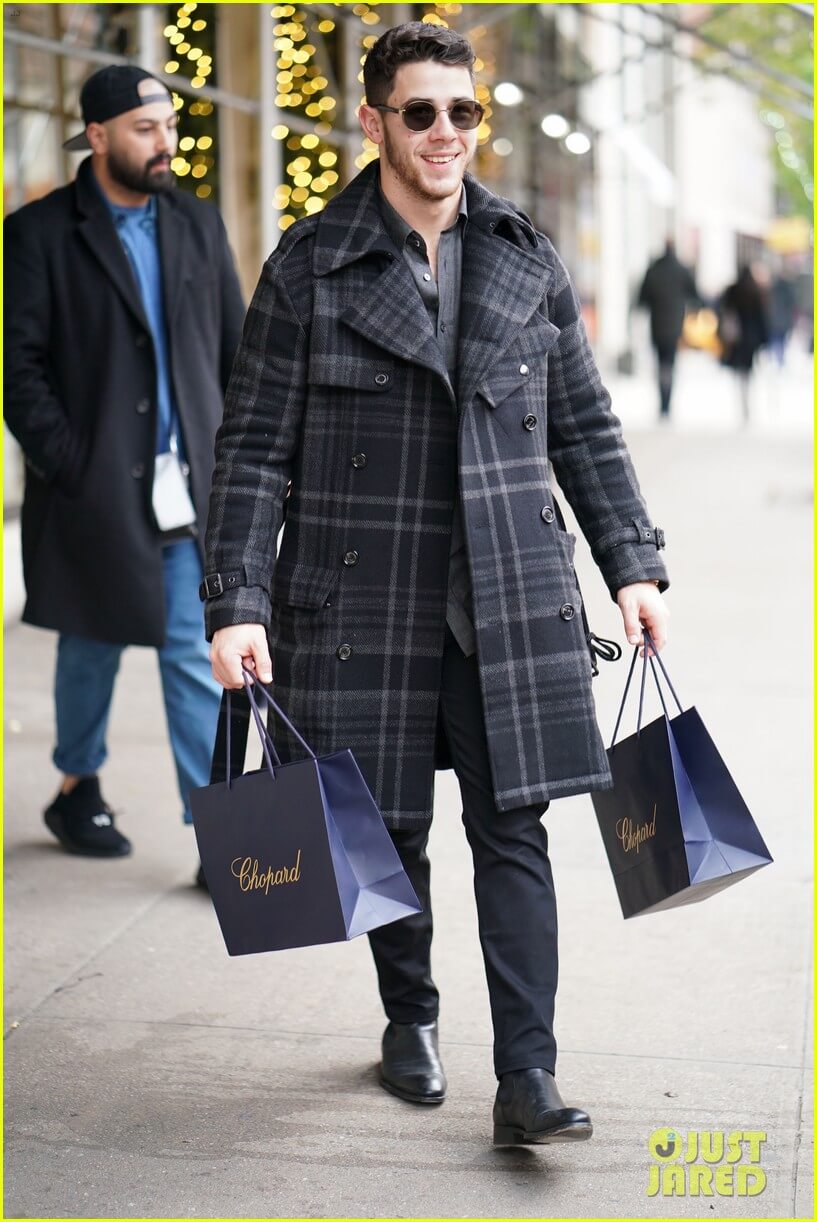 Nick Jonas shopping at Chopard (photo courtesy Just Jared)
