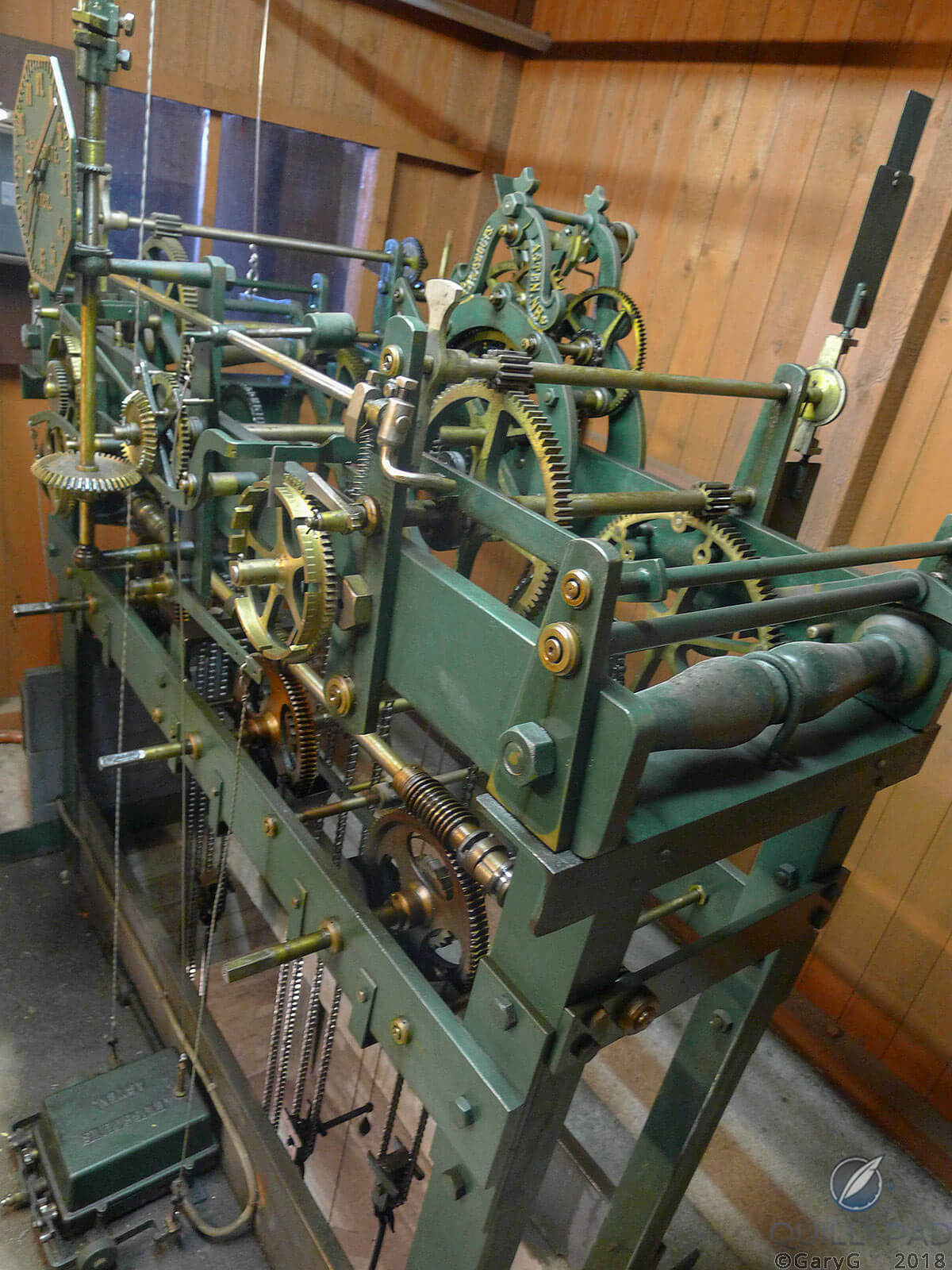 The basilica of St. Plechelm’s tower clock works, with remontoire regulator blades visible at the rear